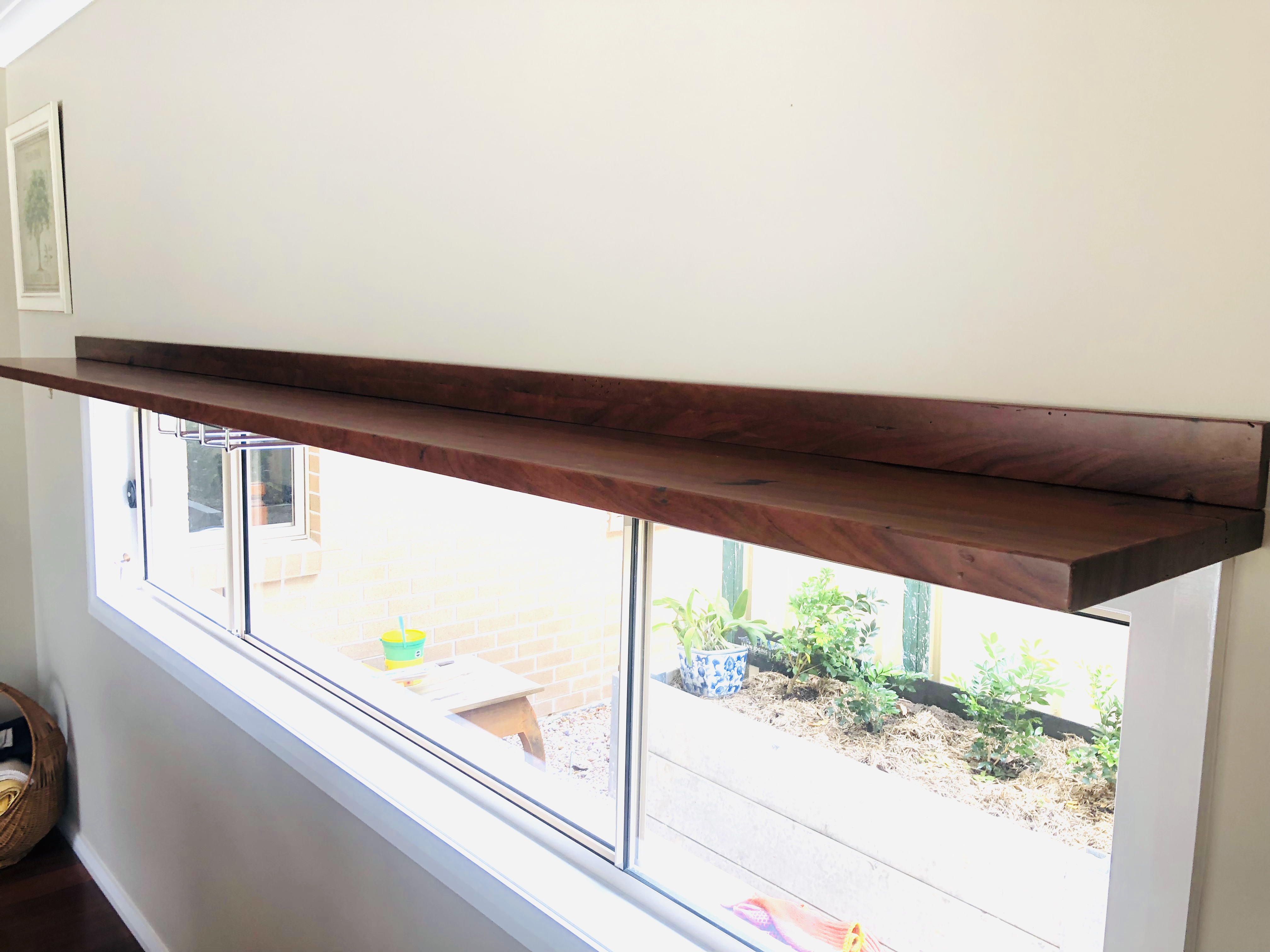 Floating hardwood shelf